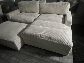 Sectional couch with ottoman