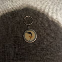 Looney Tunes road runner keychain with cartoon bird graphic