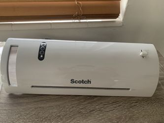 SCOTCH THERMAL LAMINATOR PLUS PACK OF THERMAL LAMINATING POUCHES