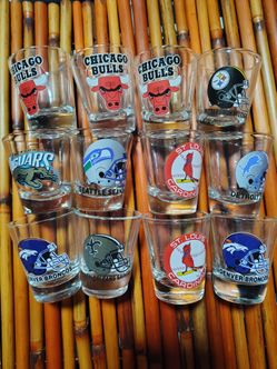12 brand new sports shot glasses all 12 for 50$