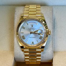 Rolex Daydate 40mm Yellow Gold Silver Roman Dial 