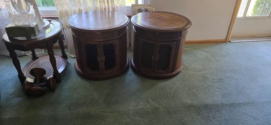 Two sets of end tables. One has drawers, the other ones around like in the photo I love