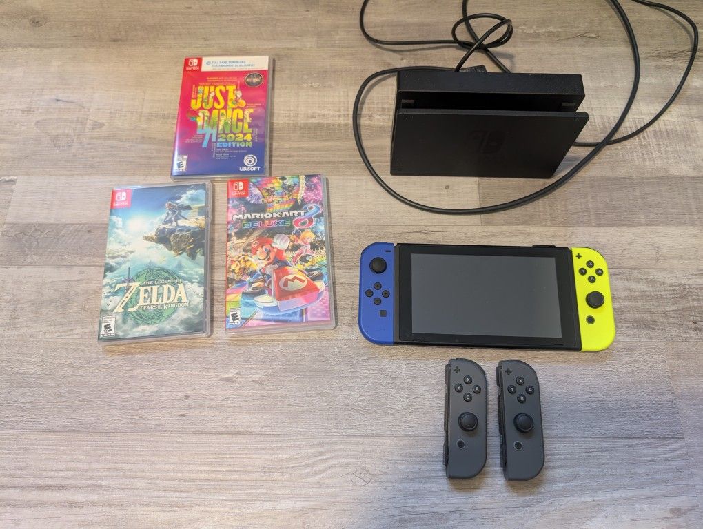 Nintendo Switch ( Games included )