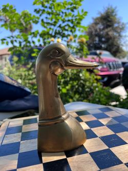 Brass duck bookend