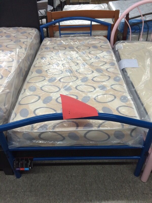 New twin bed with twin spring mattress