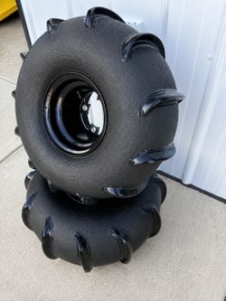 For sale 22x12x8  12  paddles drag cut light weight rimsIn good condition removed from a raptor 700 paddles are  in good condition