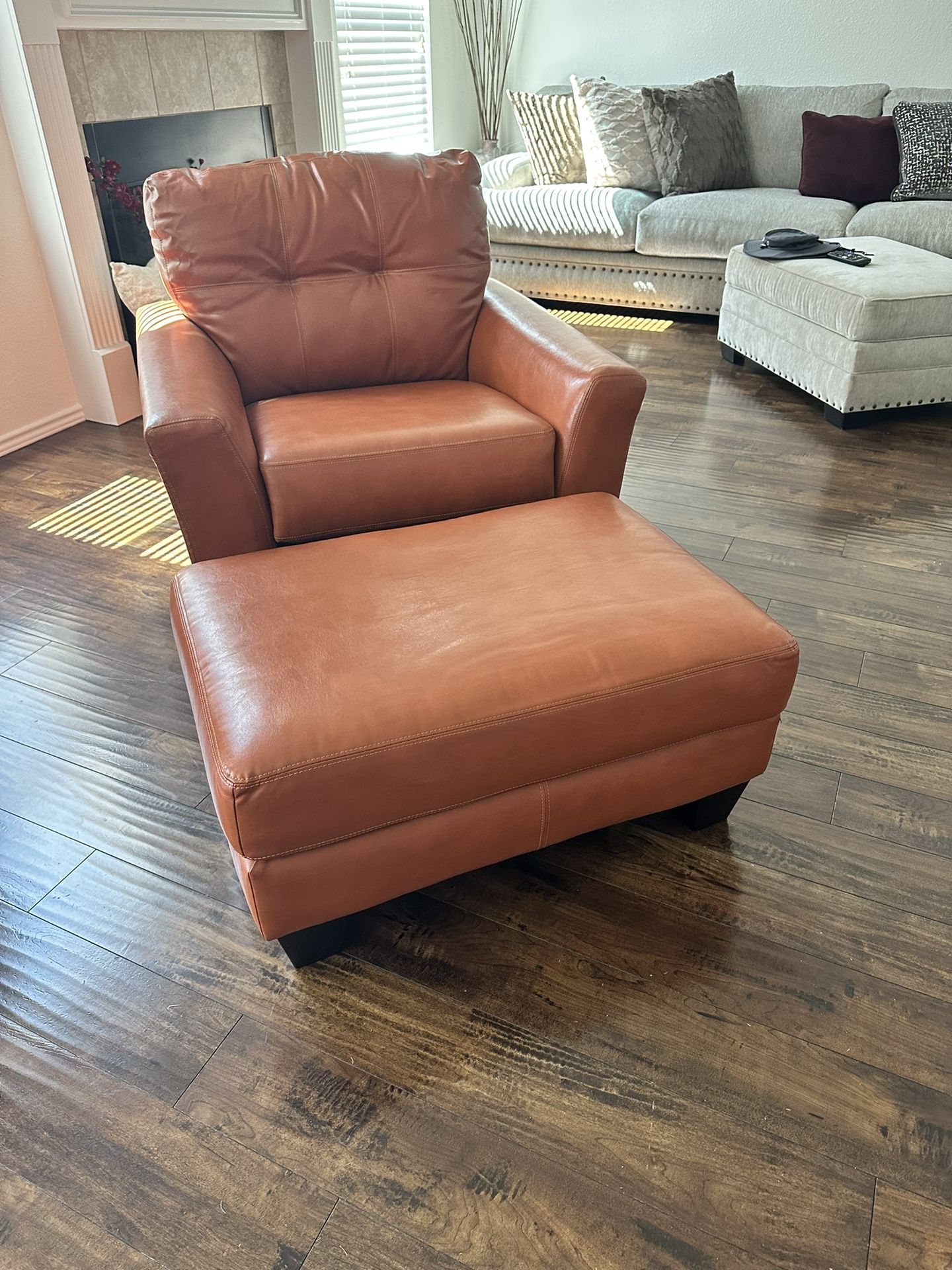 Beautiful Orange Chair and Ottoman