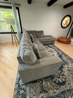 L couch and rug super good deal