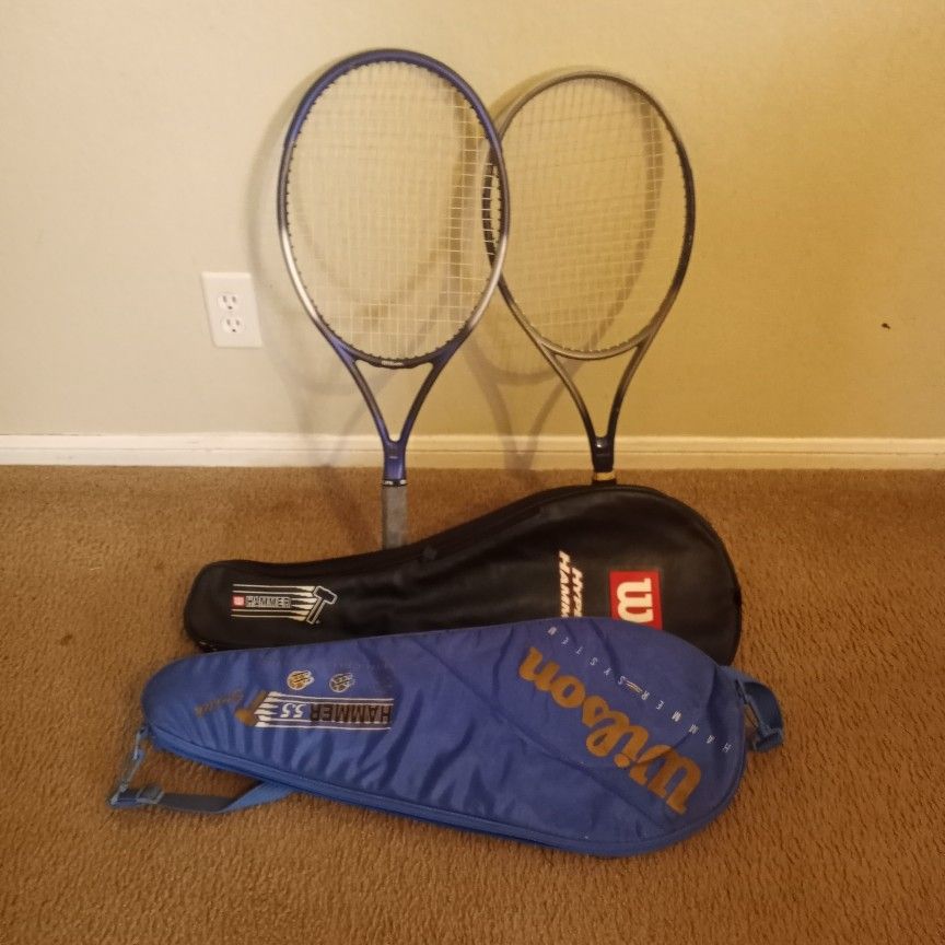 Two Tennis rackets with carriers