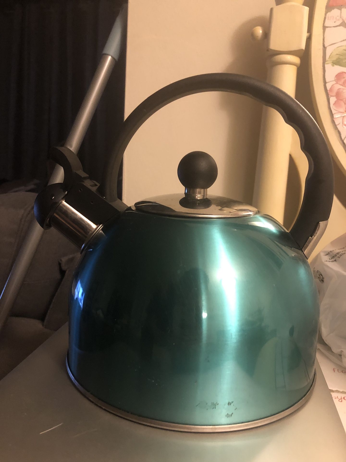 Stove top whistling tea kettle