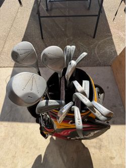 TaylorMade Golf bag with starter golf clubs