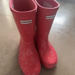 Hunter Rain Boots And Rollerskate