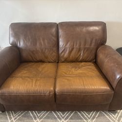Whiskey colored real Italian leather sofa with love Seat