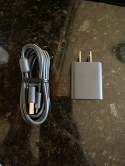 New. Micro usb cable and wall adaptor