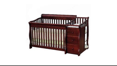 Sorelle baby crib/toddler bed with changing table/drawer assembly