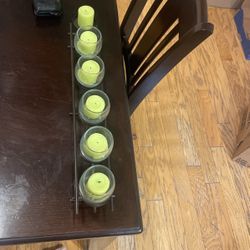 Candle centerpiece With green Candles And Glasses