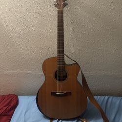 6 String Cut-away Acoustic Guitar (Strap, Case And Capo Included)