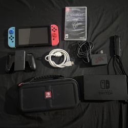 Nintendo Switch (Neon Red/Blue) – Like New + Skyrim + Accessories