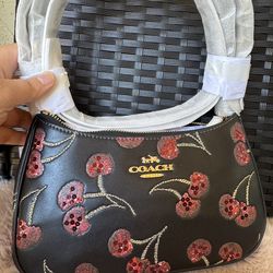 Coach Teri should bag with cherry print