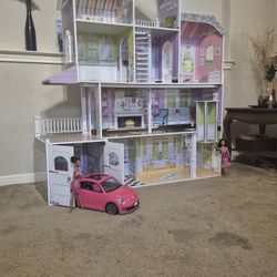 KidKraft Dollhouse with Barbie Car
