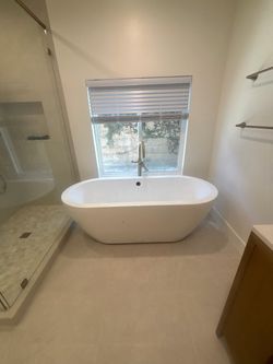 White Freestanding Soaking Bathtub
