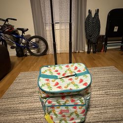 Rolling cooler and picnic blanket