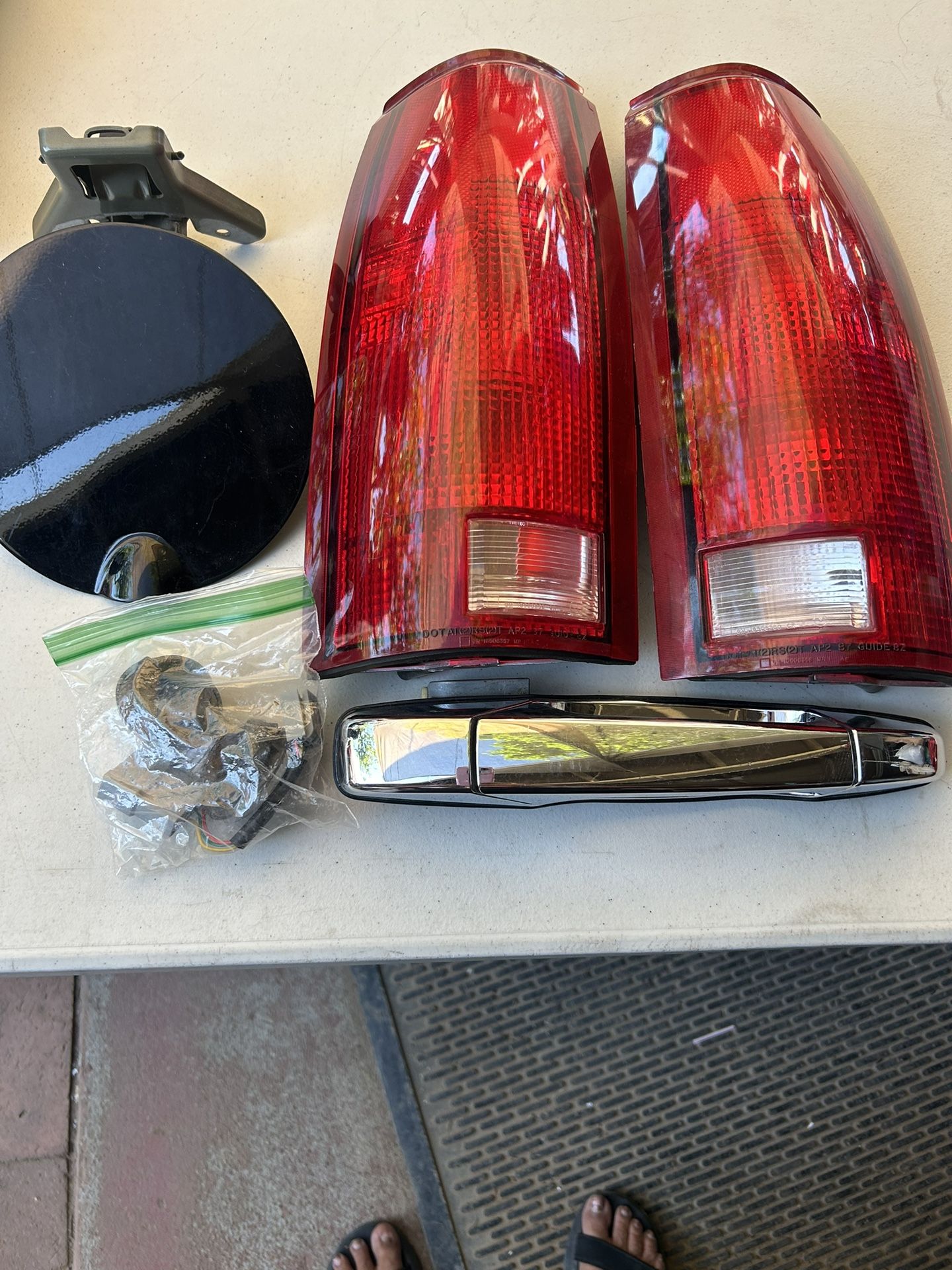 Two Tail Lights /Gas Cap/right Door Handle License Plate Light Kit. Came Off 2007 Chevy Truck All For