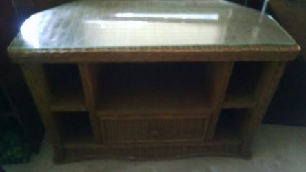Wicker/glass tv stand.