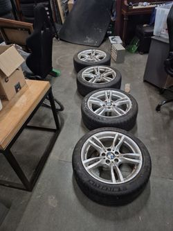 4 BMW rims plus tires