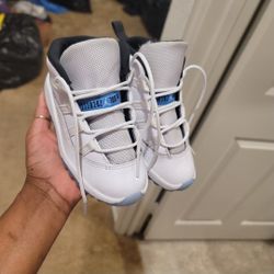 White Jordan 11s