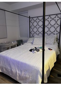 Wrought iron canopy bed