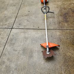 Husqvarna weedeater  with brush cutting blade