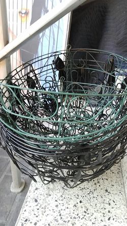 7 assorted painted metal hanging flower baskets