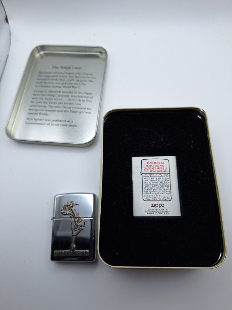 1935 Varga Girl Zippo Lighter and Tin for Sale in Providence, RI