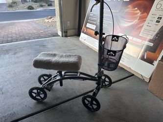 Steerable Knee Walker With Basket And Hand Brakes.