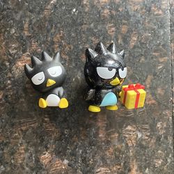 2 hello kitty bad badtz maru figures
