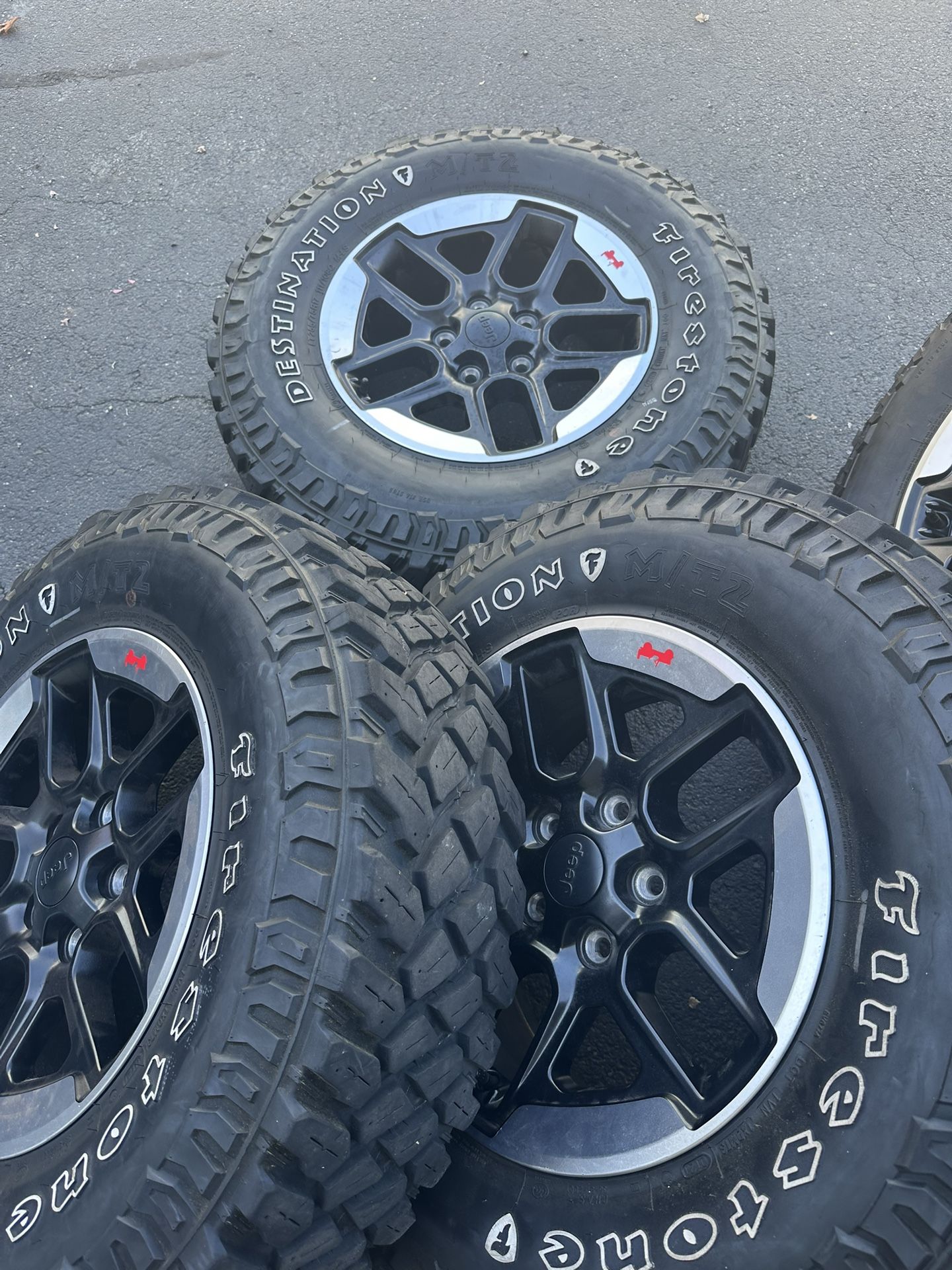 JEEP RIMS AND TIRES NEW!
