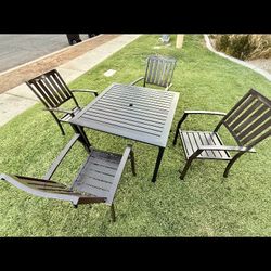 Beautiful nice quality Better Homes and Garden Patio Table and Four comfortable wide Chairs reduced to $190! (Originally $450)