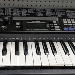 Casio CTK-720 61-Key Portable Keyboard.