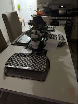 Table with 4 brand new chairs