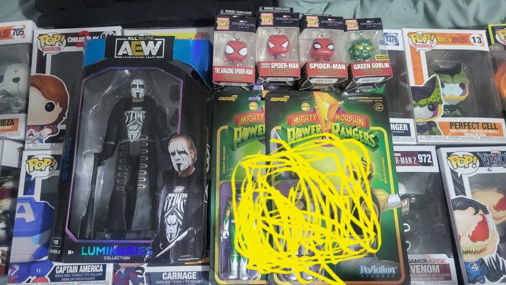 Lot Of 11 Mix Funkos And 4 Keychain Pops And 1 AEW Sting Action Figure