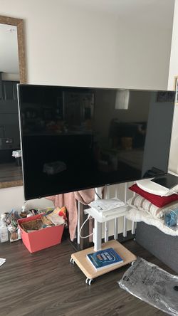 64’ Roku TV + TV stand
