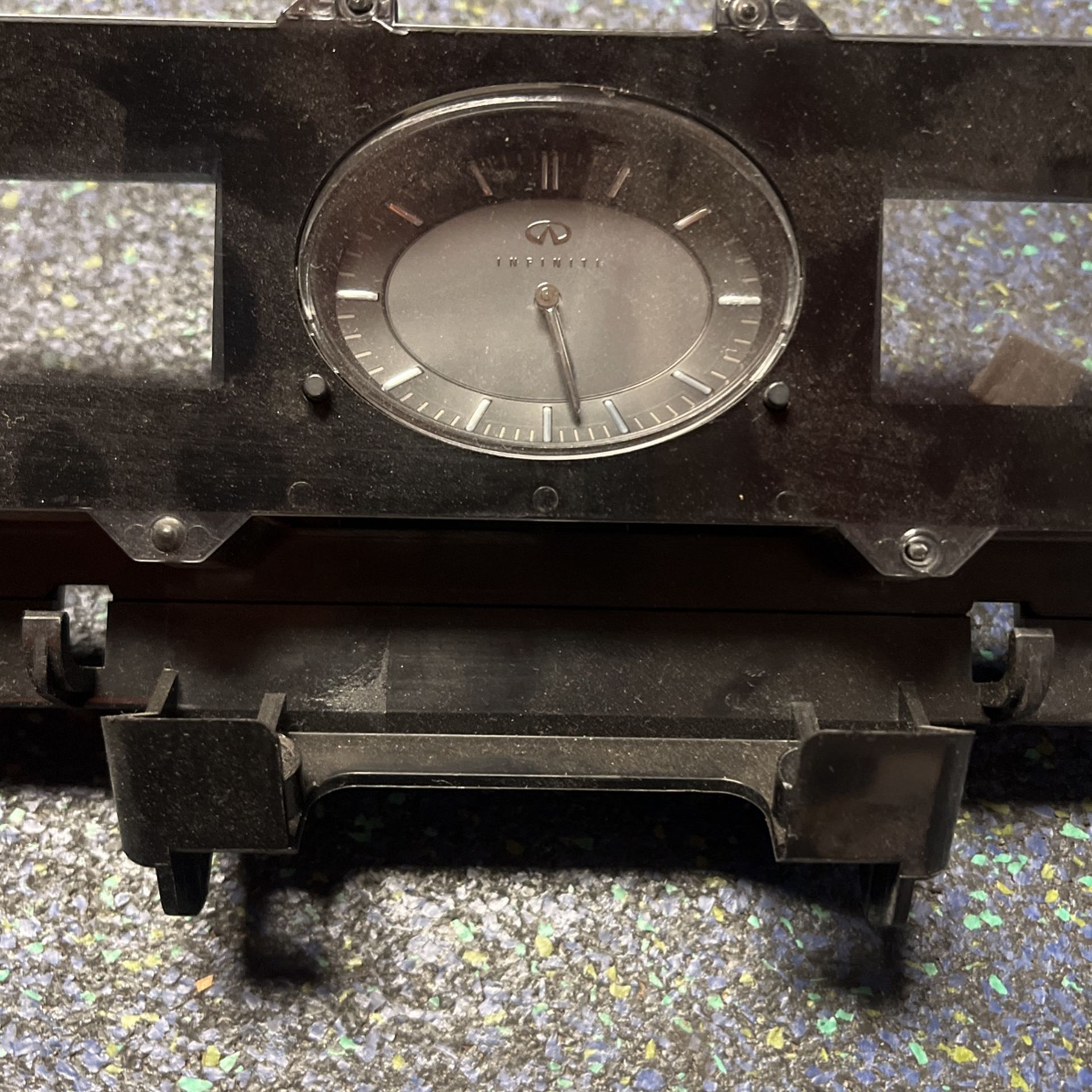 Infiniti Dash Clock And Plastic.