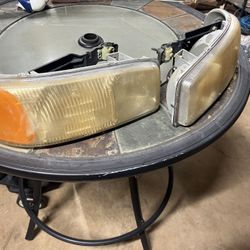 Headlights 2005 GMC SIERRA 1500 (bumper And Tail Lights also)