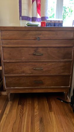 Wood Dresser, three drawers and pull out shelf