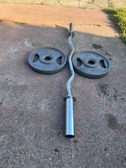 Olympic curl bar and 25 pound Olympic weights