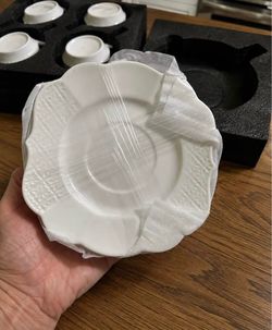 New 12pc embossed plate and saucer set