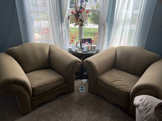 Bay window couches - tan