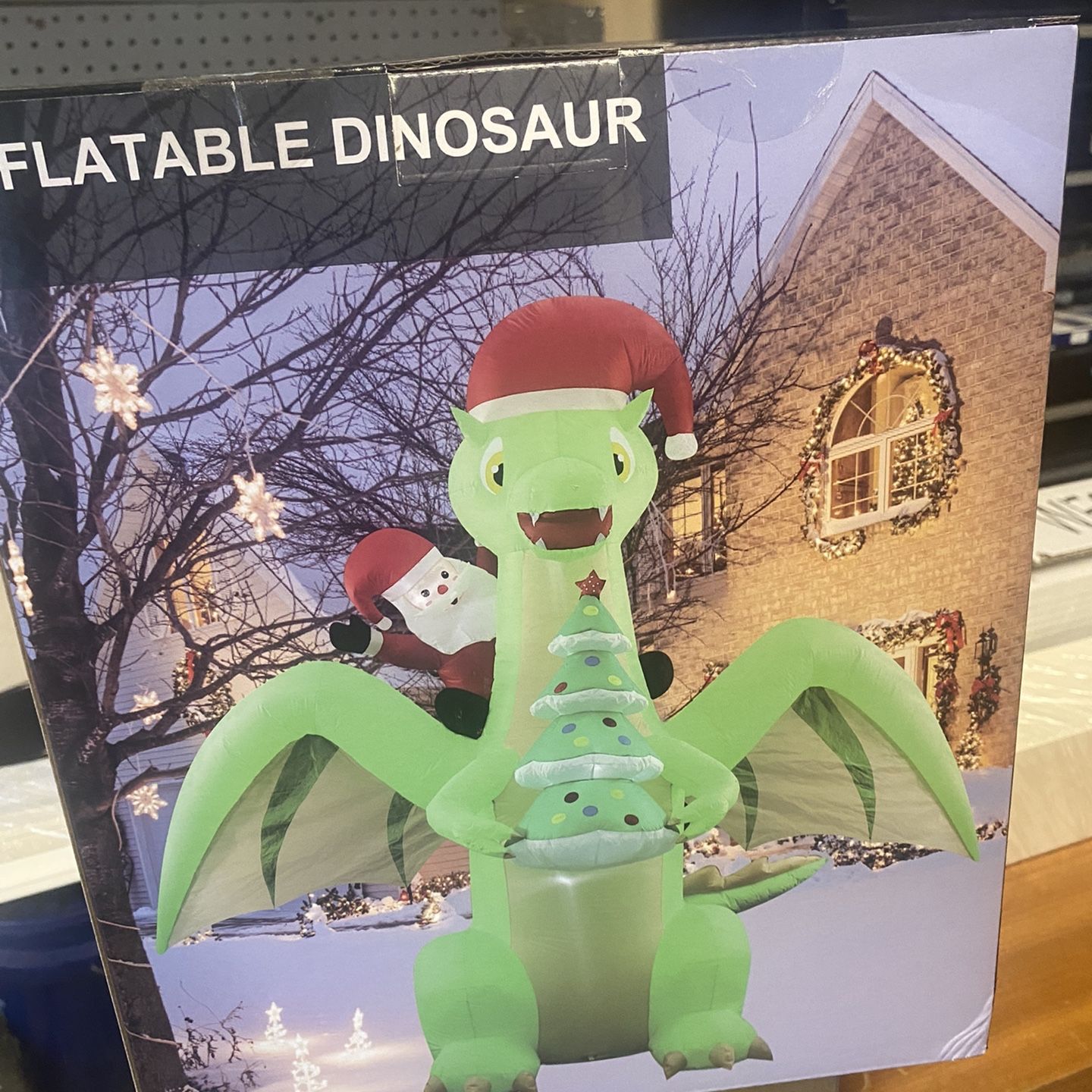 Inflatable Dinosaur with Santa 