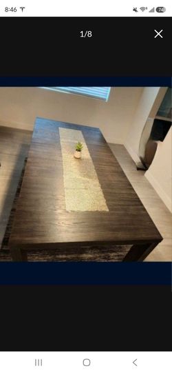 Ashley's Extendable Dining Table Seats Up To 8 People (Possibly 10 Small Chairs)